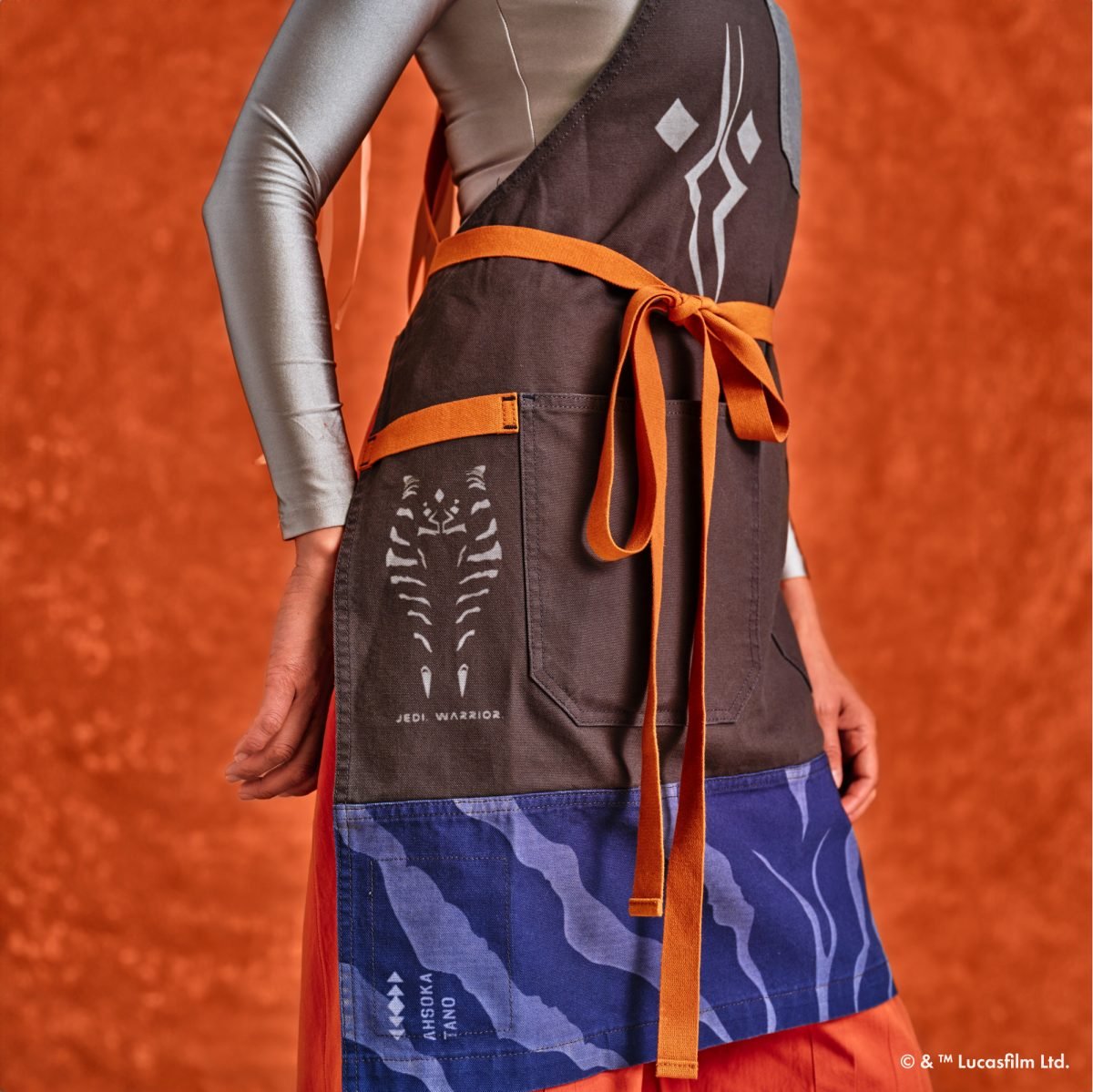 A person wearing an Ahsoka apron