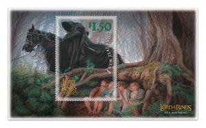 An LOTR Stamp - The Black Rider looms over the hobbits wide