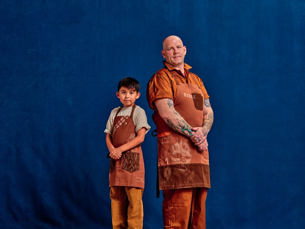 A child and an adult wearing Chewbacca aprons