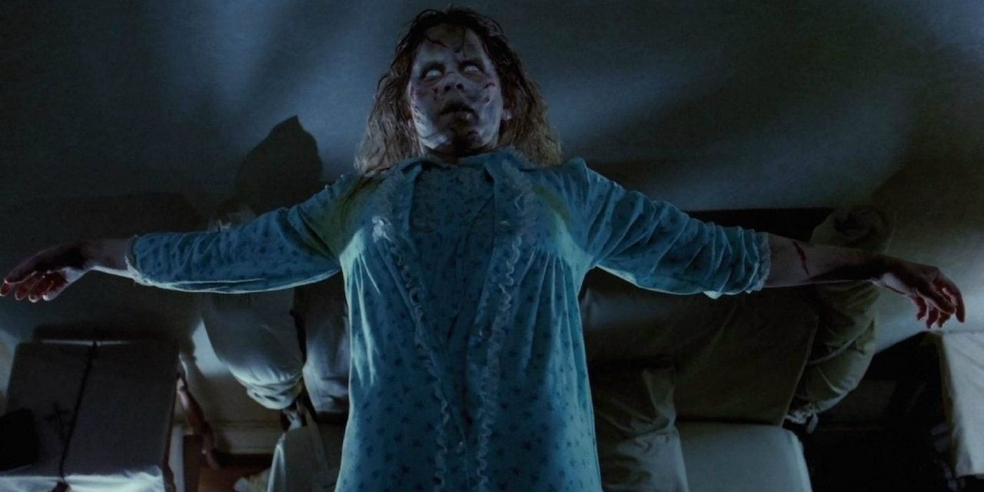 Linda Blair as Regan MacNeil possessed and floating with her arms spread wide in The Exorcist