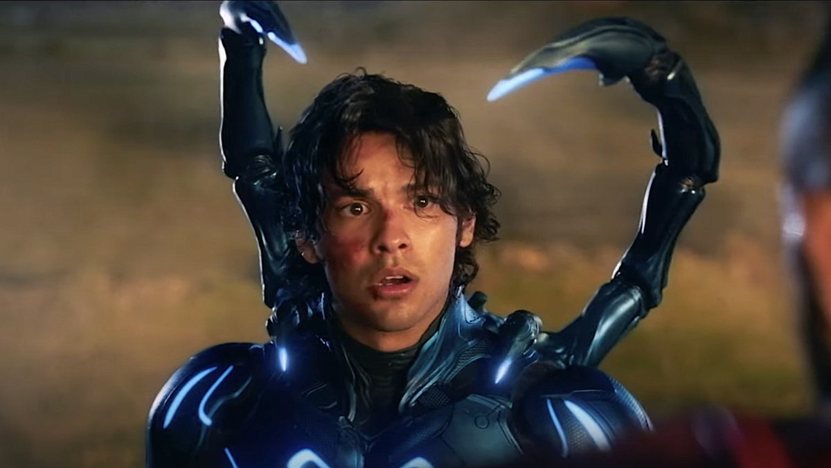 Xolo Maridueña as the Blue Beetle, in the film's final battle scene. 